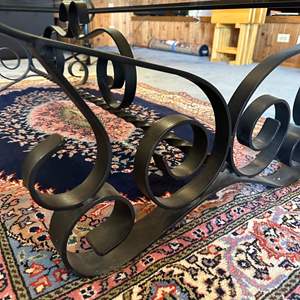 Lot #13 - Vintage wrought iron and Smokey glass top coffee table 