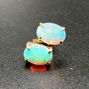 Lot #126 - opal and 14k gold studs (1.8g)