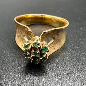 Lot #127 - 14k gold wide band with emeralds ring (4.8g)