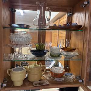 Lot #153 - Cabinet contents includes several vintage ashtrays