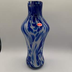 Lot #182 - Murano cased glass vase with a blue and white swirl design