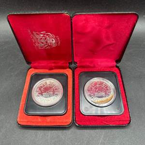 Lot #220 - (2) Canadian maple leaf silver dollars 