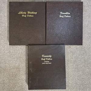 Lot #225 - Empty Dansco Liberty, Franklin, and Kennedy coin albums 