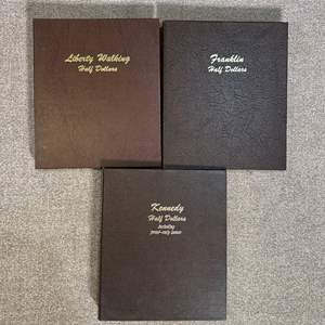 Lot #226 - Empty  Liberty, Franklin, and Kennedy coin albums 