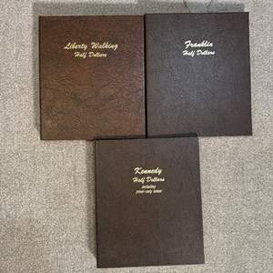 Lot #229 - Empty Empty Liberty, Franklin, and Kennedy coin albums