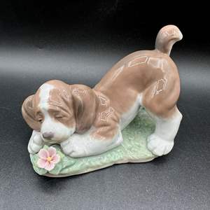 Lot #60 - Lladro Porcelain "A Sweet Smell" Dog with Flower Figurine