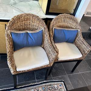 Lot #116 - Two wicker & Wood Chairs with down feather back pillows, each with blue and cream slip cases