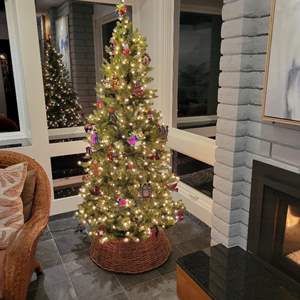 Lot #197 - 6 foot Christmas tree with wicker base