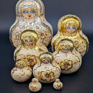 Lot #21 - Vintage Ukrainian Nesting Doll Matryoshka Pyrography & Gold (Set of 9)