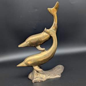 Lot #130 - Midcentury Modern Bronze Swimming Dolphins Statue