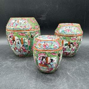 Lot #85 - Three Qing Canton Famille Rose jars with covers, Circa 1850s