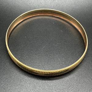 Lot #151 - 14k gold tri-color bangle (9.5g)