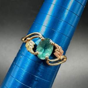 Lot #173 - 14k gold ring with .65c light blue sapphire  (1.6g)