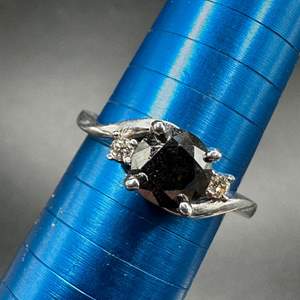 Lot #175 - 14k white gold ring with .75 carat black diamond solitaire (2.9g)