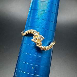 Lot #194 - 14k gold ring with diamonds (1.4g)