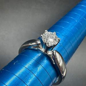 Lot #205 - 14k white gold ring with .65 carat diamond solitaire (3.4g)