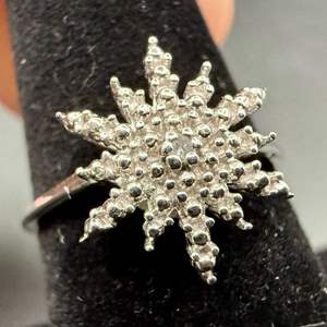 Lot #22  - Diamond accent starburst sterling silver ring, Size 7