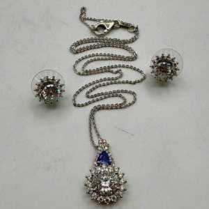 Lot #50  - 120 facet Moissanite & Tanzanite pendant with matching earrings set in sterling silver (3.75ctw, 6.8gtw) 