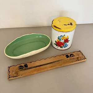 Lot #71  - Vintage floral tin canister, wood ware towel rack & serving bowl 