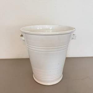 Lot #75  - White world market ceramic pot 