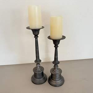 Lot #77  - Pair of tall candle holders with faux candles 