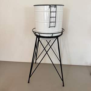 Lot #105  - Decorative water tower plant pot 