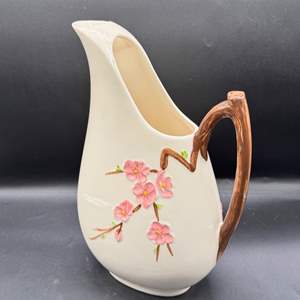 Lot #110  - Decorative ceramic pitcher 