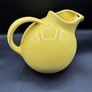 Lot #112  - MCM Yellow Tilt Ball Jug Pitcher with Ice Lip