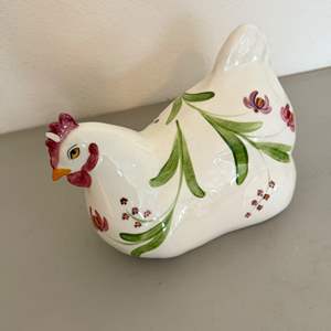 Lot #121  - Ceramic hand painted chicken figurine 