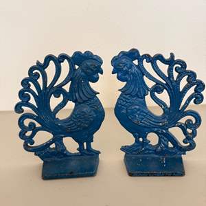 Lot #128  - Cast iron rooster bookends