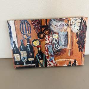 Lot #170  - Canvas wine themed artwork 