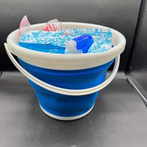 Lot #240  - Collapsing bucket with new cleaning items