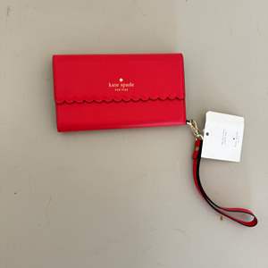 Lot #247  - Authentic Kate Spade phone case 