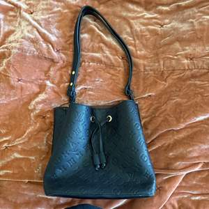 Lot #255  - Designer INSPIRED bucket bag 