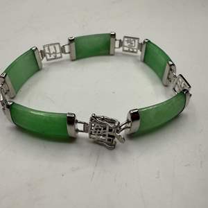 Lot #270  - Burmese green jade & sterling silver bracelet (10.4gtw)