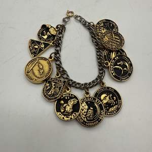 Lot #271  - Vintage NASA Apollo 7-17 charm bracelet, very cool!