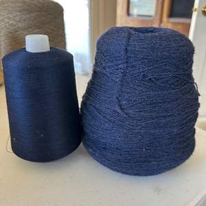 Lot #69 - Two large dark blue spools