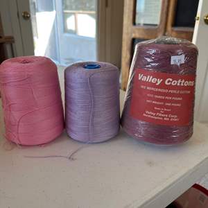 Lot #71 - 3 large cotton spools of pink/purple tones