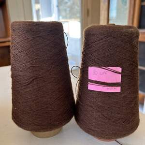 Lot #74 - Two large brown wool spools