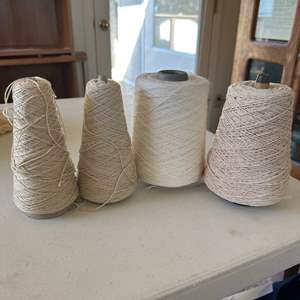 Lot #76 - 4 spools of various white tones in cotton/wool blends