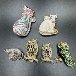 Lot #103 - Cat and owl brooches