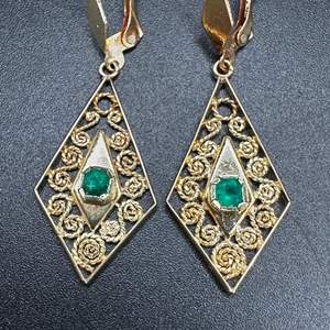 Lot #112 - 14k gold chandelier earrings with .3c emeralds