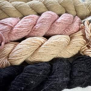 Lot #144 - 13 skeins of Rowen and Berroco 4 color themes