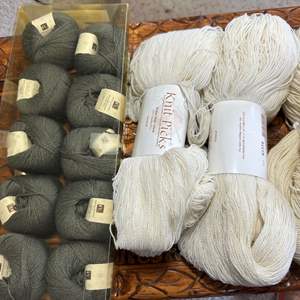 Lot #193 - 3 winter white wool skeins and 10 cashmere/silk grey skeins