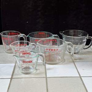 Lot #207 - Pyrex glass measuring cups 