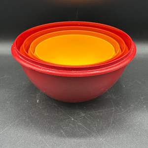 Lot #209 - (4) Tupperware stacking bowls 