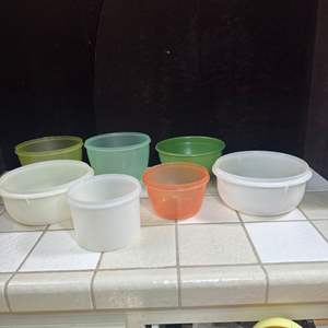 Lot #216 - Tupperware and other bowls 