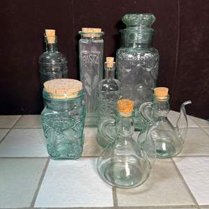 Lot #238 - Glass containers and olive jars