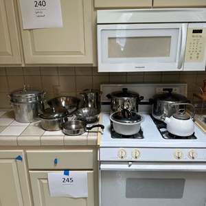 Lot #246 - Stainless pots and pans 