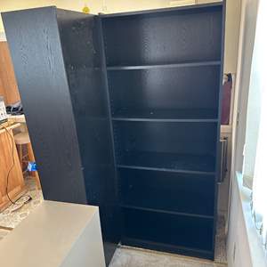 Lot #291 - 4 Matching MDF bookcases 